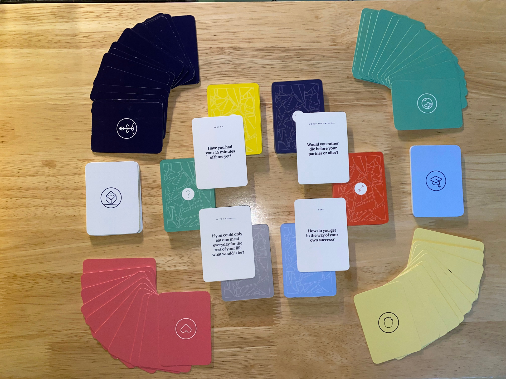 VIDANITY card decks spread on a wooden table